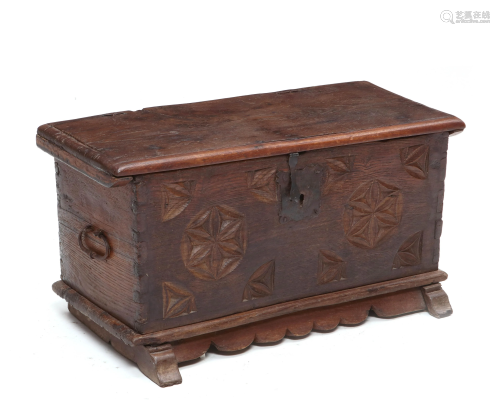 A small Spanish Baroque carved chestnut chest