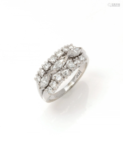 A diamond and 14k white gold ring