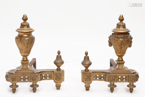 A pair of Louis XVI style gilt bronze andirons