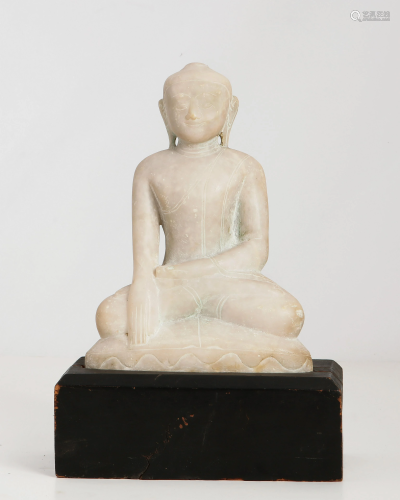 A Burmese carved marble figure of a seated Bu…