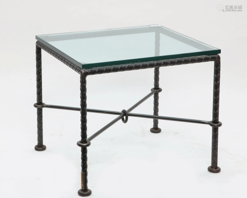 An Ilana Goor patinated iron & plate glass table
