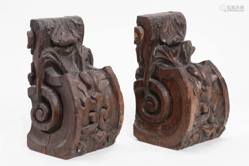 A pair of Baroque style carved oak corbels
