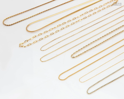 A collection of nine 14k and 18k gold chains