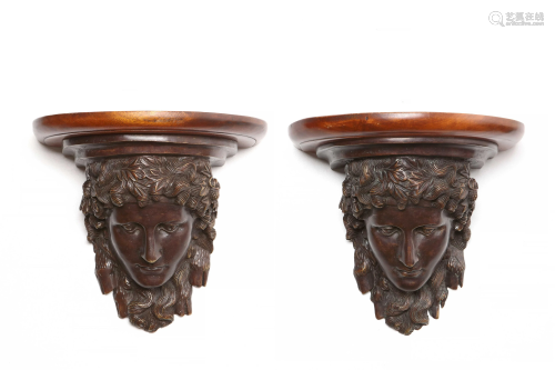 A pair of patinated bronze and mahogany wall b…