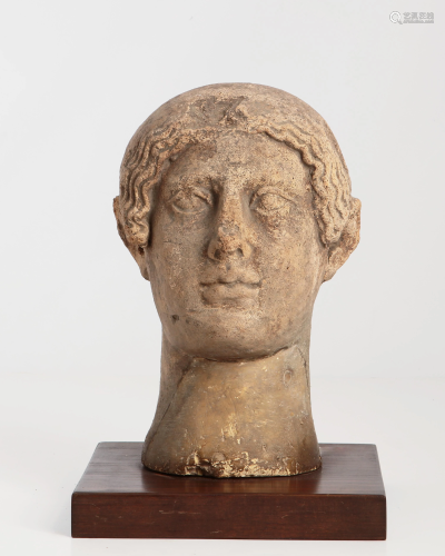 An Etruscan terracotta votive head