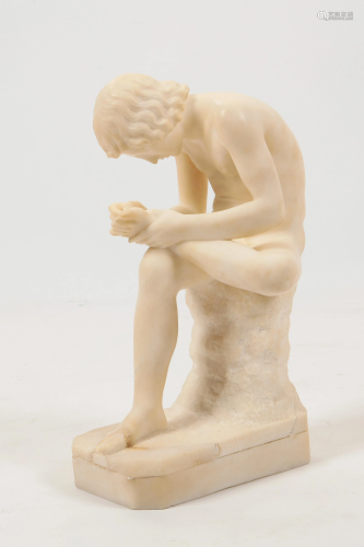 An Italian carved alabaster figure of Spinario