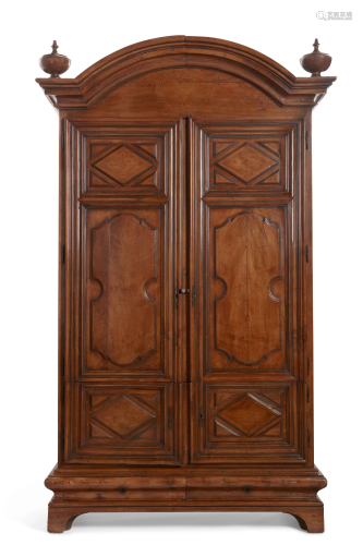 A Continental Baroque inlaid walnut armoire