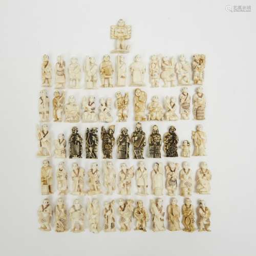 A Group of Fifty-Six Miniature Ivory Carved Japanese Figures