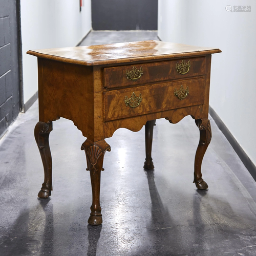 A George II figured walnut dressing table, mid 18th