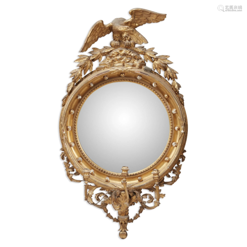 Classical giltwood bull's eye looking glass, first
