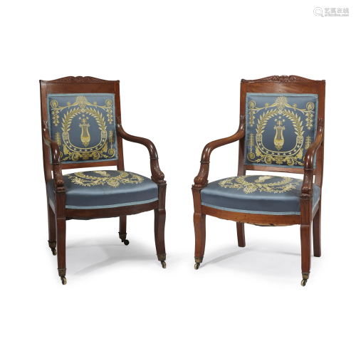 Pair of Classical carved mahogany armchairs associated