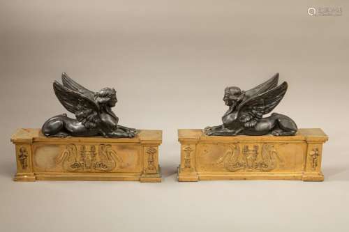 Pair of bronze andirons with brown and golden pati…