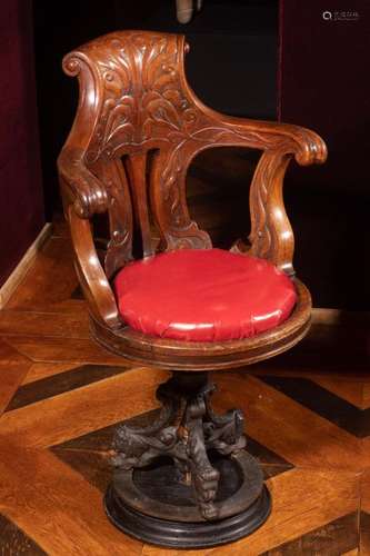 Mahogany swivel armchair with openwork backrest. I…