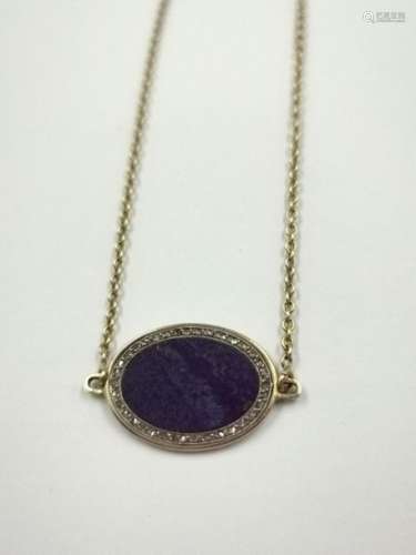 Necklace in 18k yellow gold decorated with an oval…