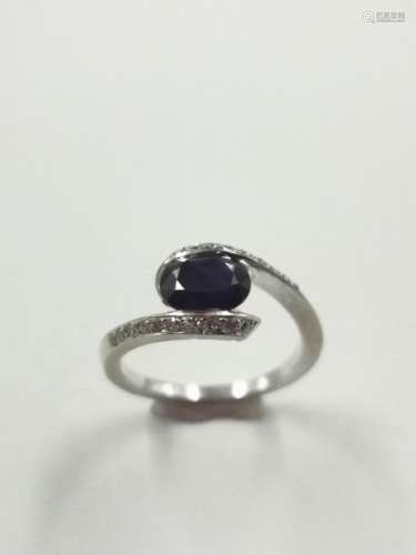 Ring in 18k white gold paved with diamonds encircl…