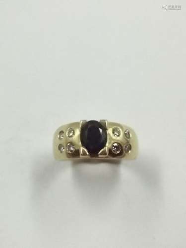 Flat ring in 18k yellow gold surmounted by an oval…
