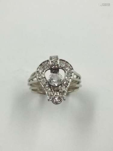 Ring in 18k white gold surmounted by a diamond pav…