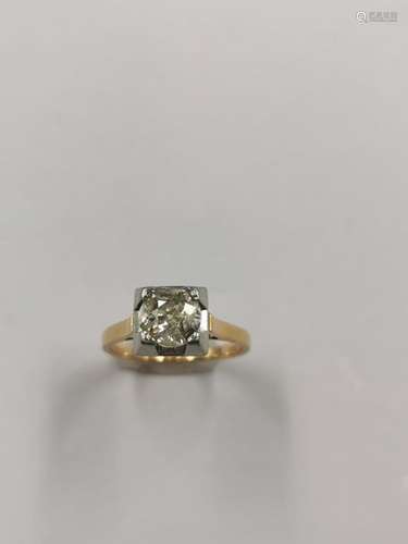 Solitaire in 18k yellow and white gold surmounted …