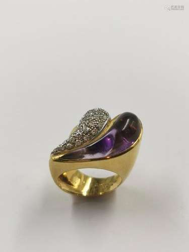 Ring in 18k yellow gold decorated with an amethyst…