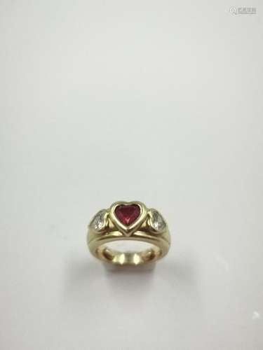 18k yellow gold ring surmounted by a ruby and two …