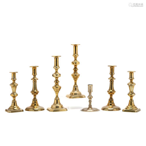 Seven Antique Brass Candlesticks