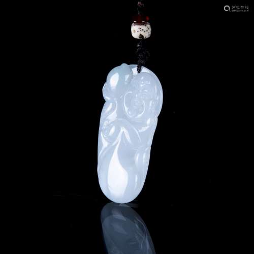 A CARVED JADEITE 'BUDDHA' PENDANT