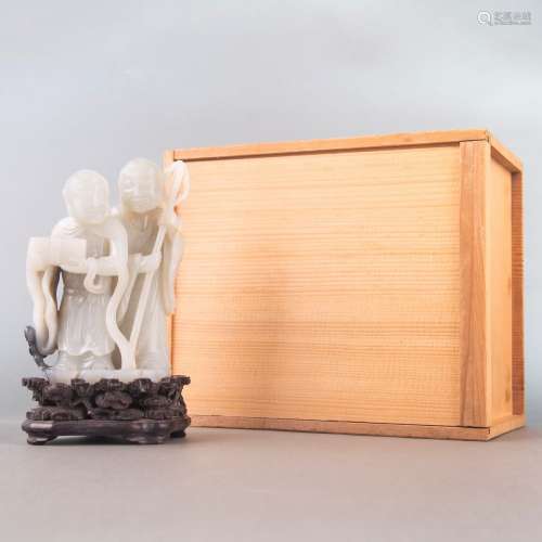 A WHITE JADE CARVING OF THE 'HEHE ERXIAN' QING PERIOD