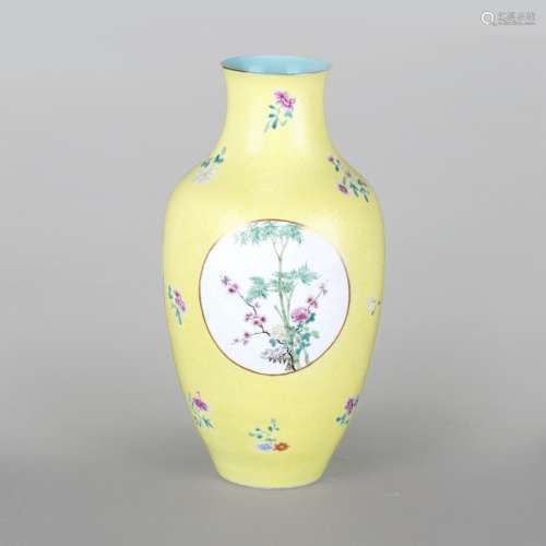 A FAMILLE ROSE YELLOW-GROUND SGRAFFIATO VASE, LATER QING