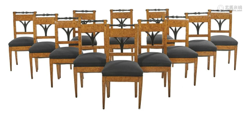 Twelve Biedermeier Ebonized and Elm Dining Chairs