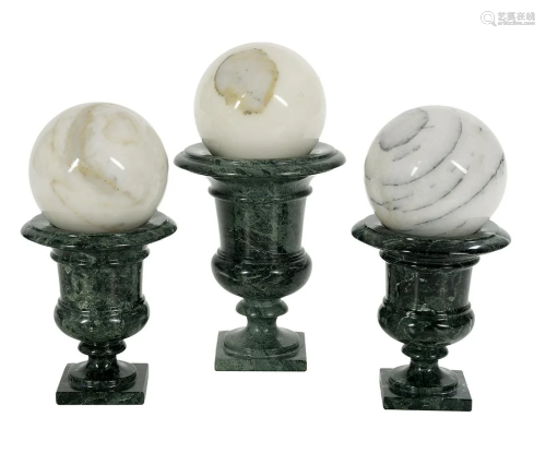 Three Marble Urns with Carpet Boules