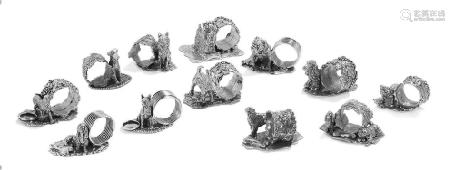 Twelve Silverplate Figural Dog Napkin Rings