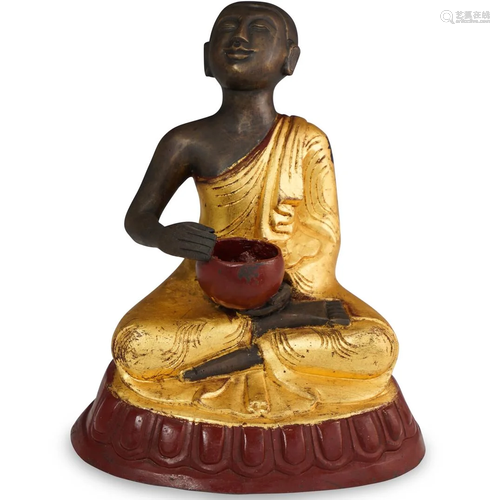 Patinated and Gilt Bronze Buddha