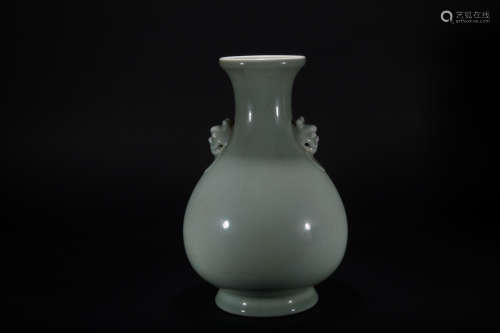 Qing dynasty peacock blue glaze vase
