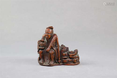 A Wooden statue of Taoist Immortal 