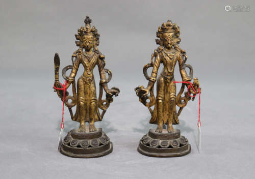 A Set of Nepalese Gilt Bronze Buddha Statues