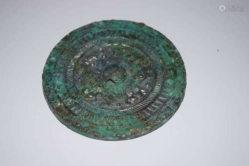 A Chinese Bronze Mirror