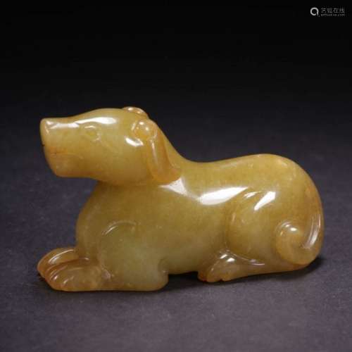 A CHINESE CARVED YELLOW JADE ORNAMENT