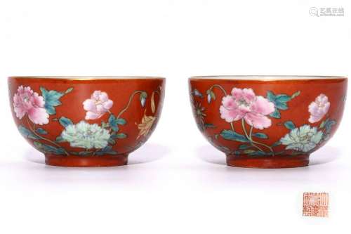 A PAIR OF CHINESE RED GROUND PORCELAIN CUPS