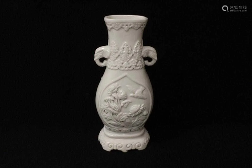 An Old vintage Chinese white porcelain vase …