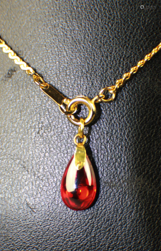 A FLASH RED GEM PENDANT,1/2