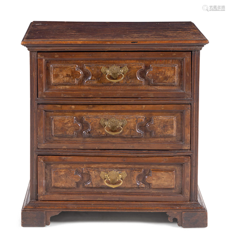 An Italian Walnut Chest of Drawers