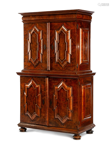 An Italian Carved Walnut Cabinet