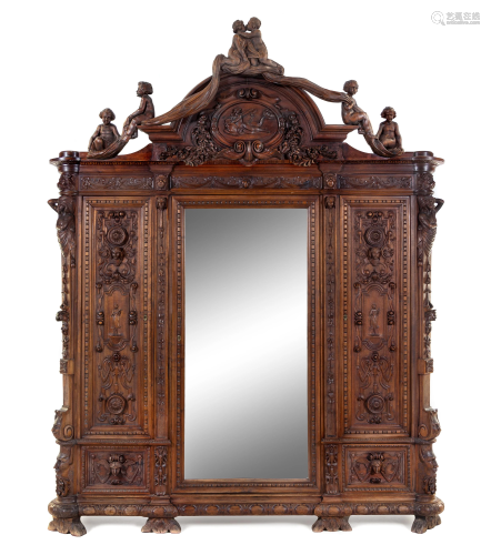 A French Renaissance Revival Carved Walnut Armoire