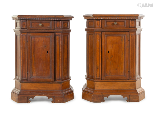 A Pair of North Italian Carved and Paneled Walnut