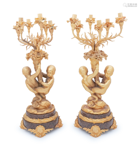 A Pair of Louis XV Style Gilt Bronze Figural Four-Light