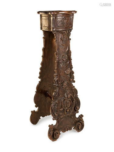 An Italian Baroque Style Carved Walnut Pedestal