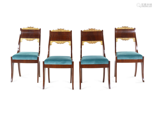 A Set of Four Russian Parcel Gilt Side Chairs