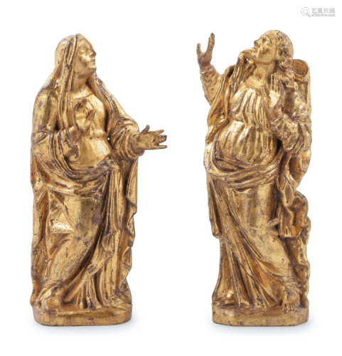 A Pair of Continental Giltwood Relief Carved Figures