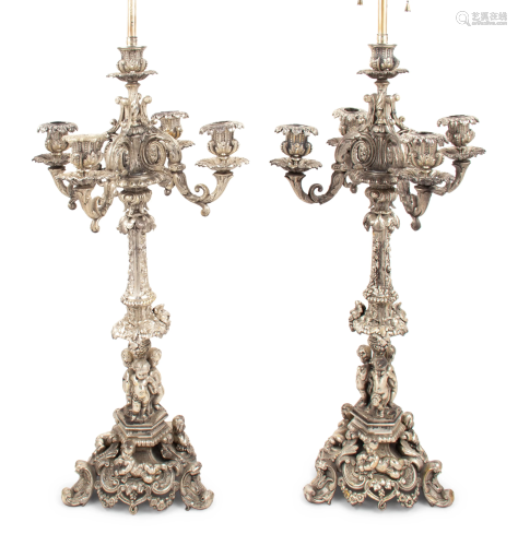 A Pair of Silvered Cast Metal Candelabra Mounted as