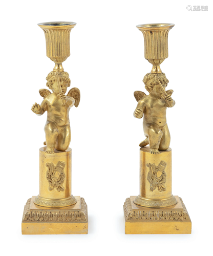 A Pair of Louis XVI Gilt Bronze Figural Candlesticks